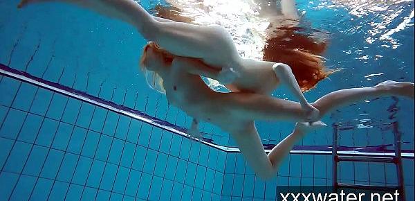  Milana and Katrin strip eachother underwater
